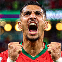 摩洛哥门将布努在四分之一决赛中扑出点球后怒吼庆祝的特写镜头